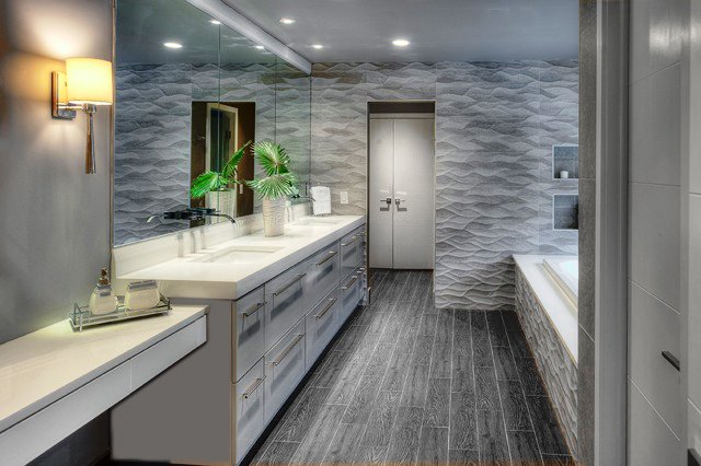 Grey bathroom with tub and dual vanity