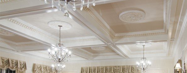 Ornate ceiling architectural details with medallions, coffers and chandeliers